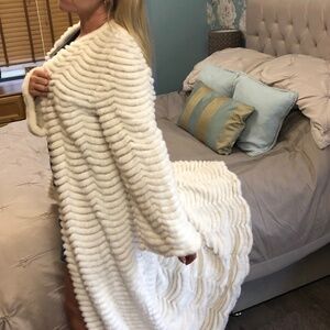 Exquisite couture real fur platinum-quality full-length mink coat.